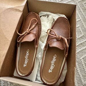 Brand new never worn easy moc size 9.5